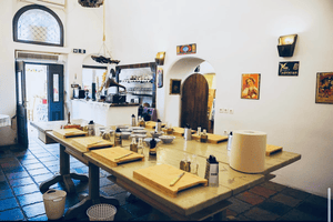 big table with cooking staff at a traditional cave
